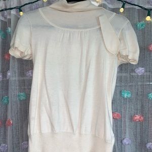 White turtle neck shirt